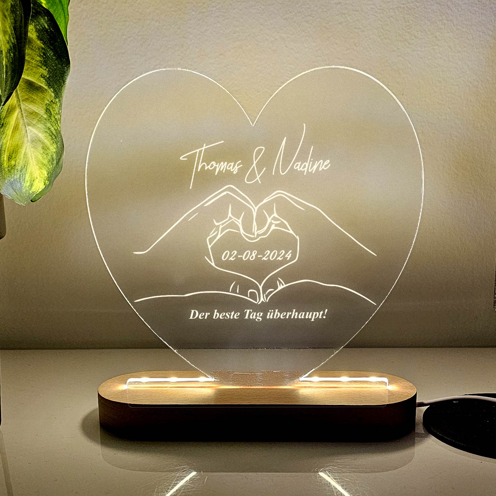 LED-Herzlampe mit Herzformende Hände