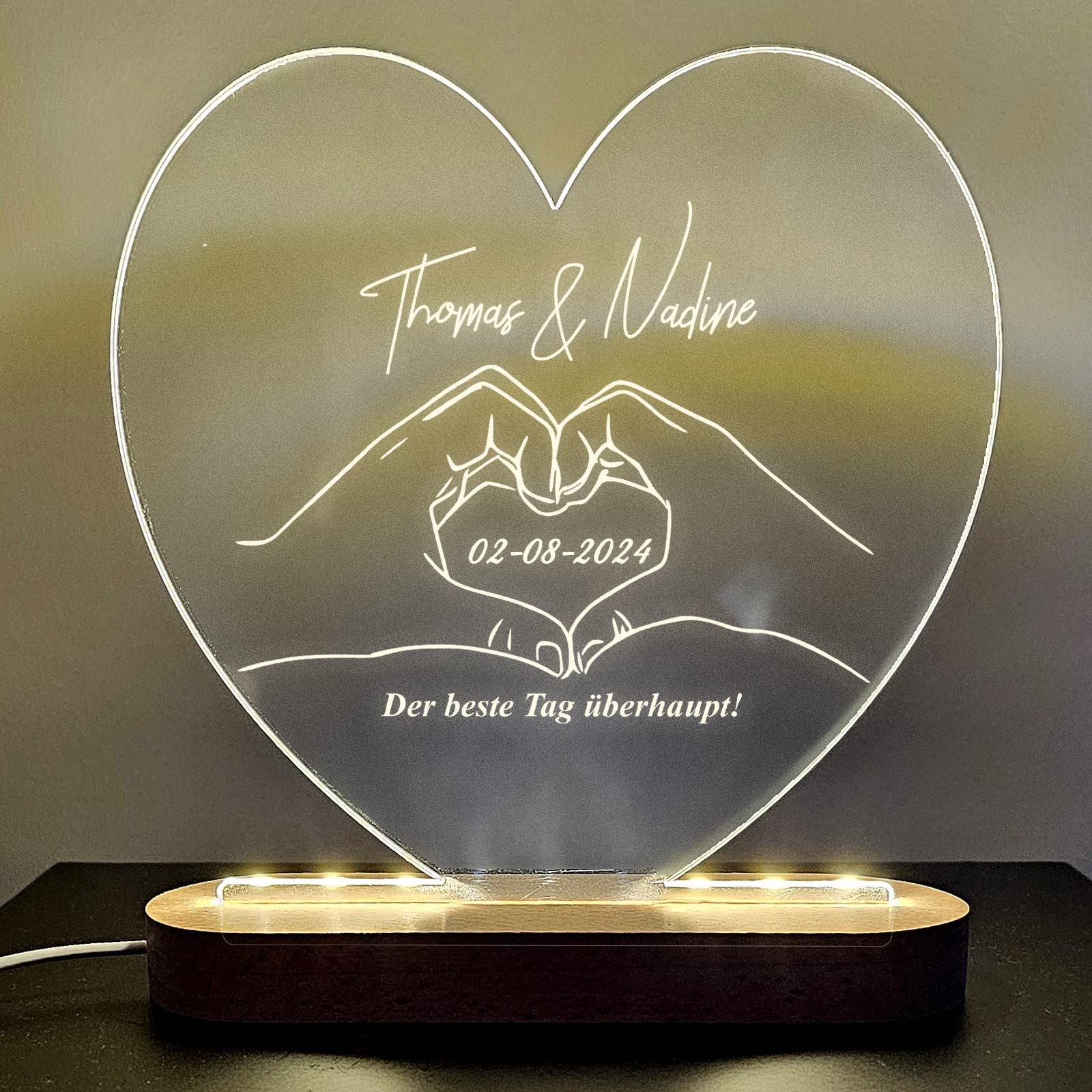 LED-Herzlampe mit Herzformende Hände